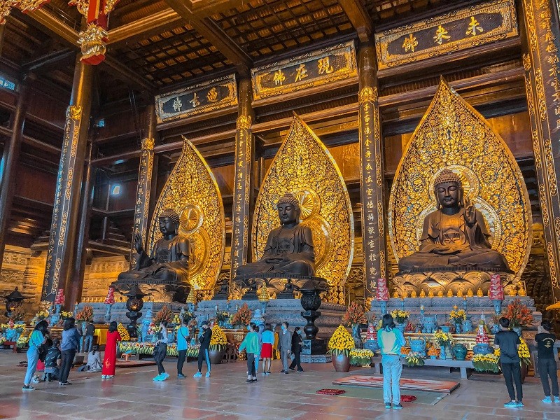 Feel the epic scale at Bai Dinh pagoda: massive courtyards and towers unmatched in Ninh Binh's spiritual scene.