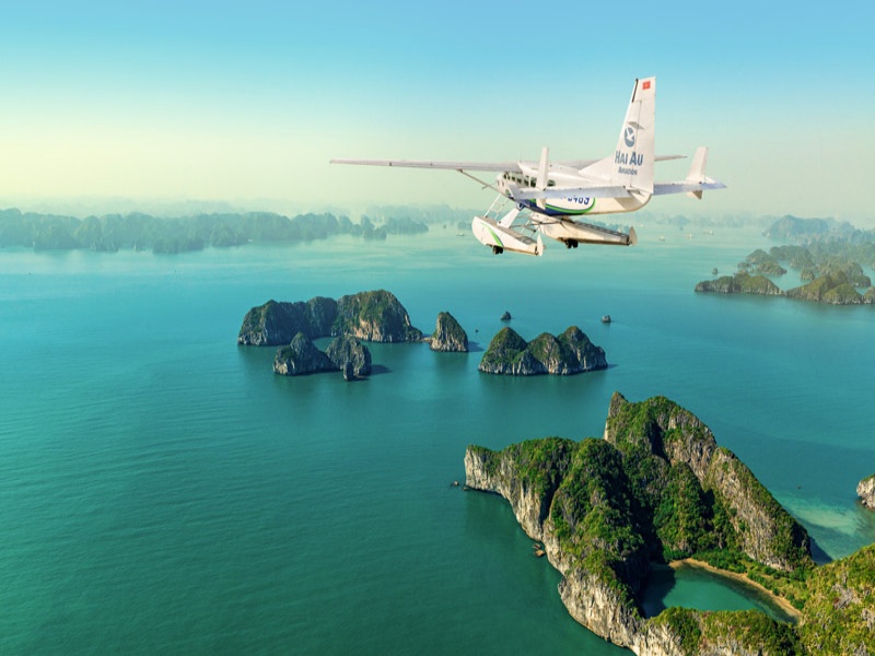 A seaplane offers a unique and quick way to reach Ha Long Bay, providing stunning aerial views