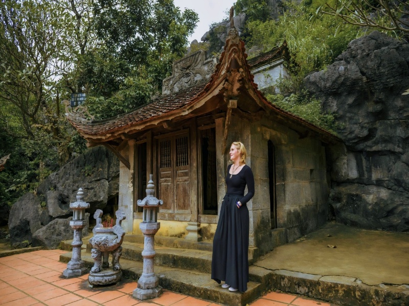 Climb to Upper Pagoda—rewarding vistas: Karsts, seasonal paddies, Tam Coc expanse.