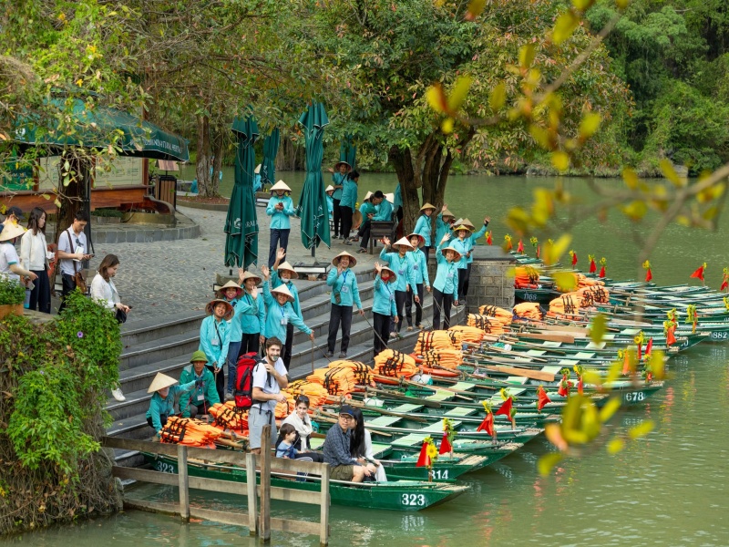 Grab tickets at entrance, hop on boat for Trang An caves now!