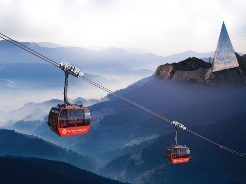 Take the cable car to visit Fansipan peak for breathtaking mountain views.
